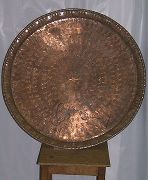 Hammered metal plate